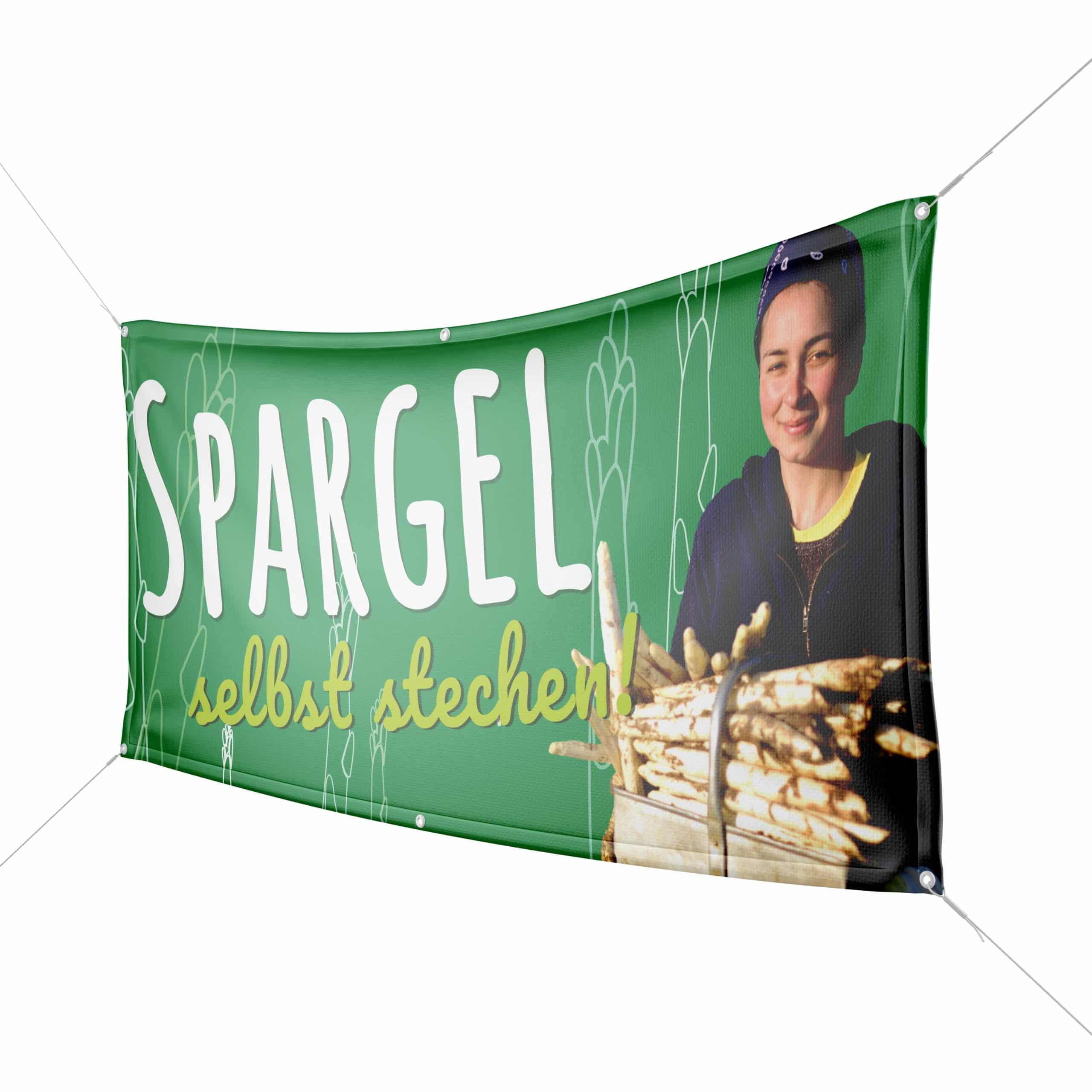 Grünes Banner mit Aufschrift "Spargel selbst stehen!" und Frau mit Spargel